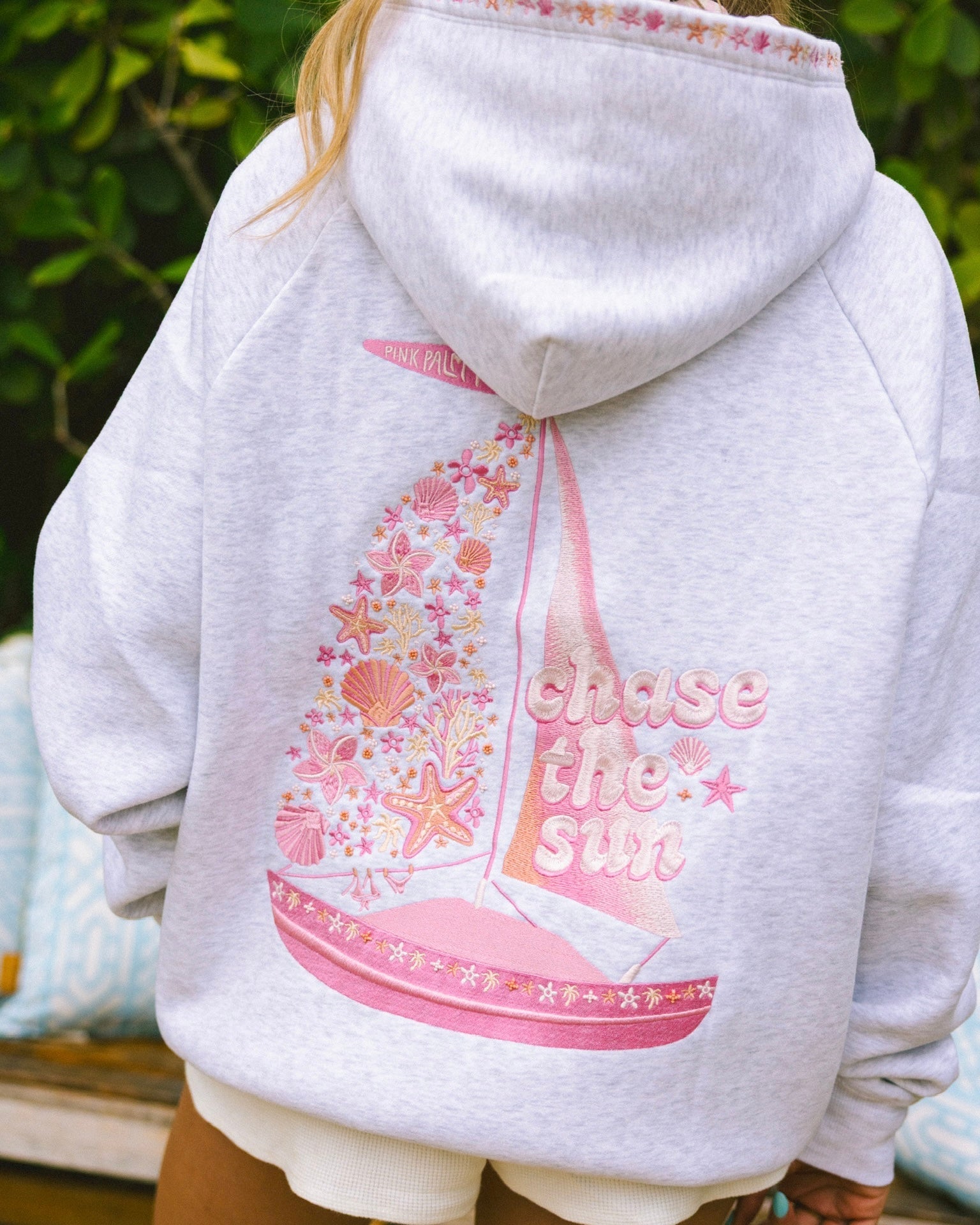 "Chase the Sun" Relaxed Hoodie, relaxed fit with an adjustable drawstring hood and pocket, in Heather Cloud - coastal preppy aesthetic beach style by Pink Palm Puff