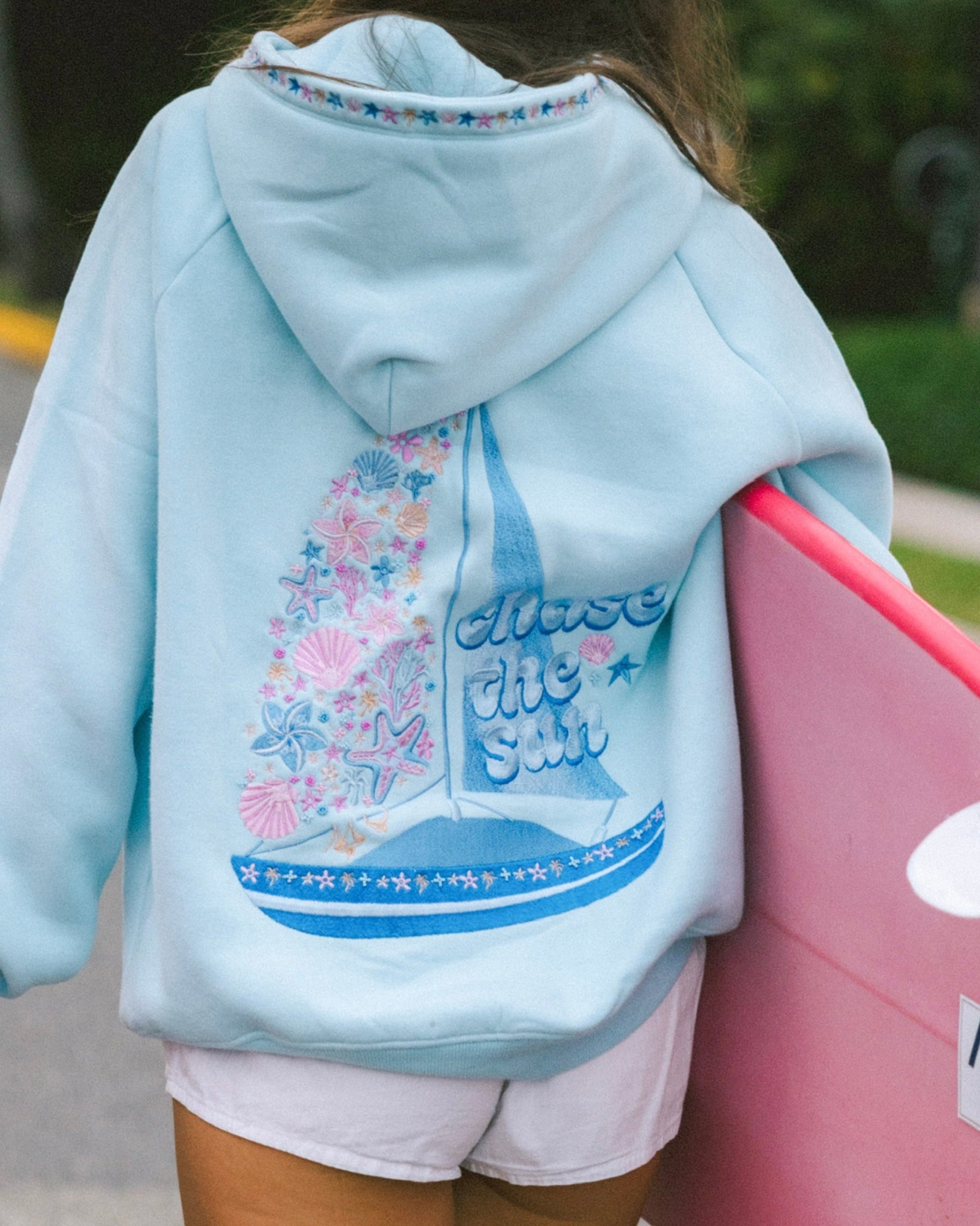 "Chase the Sun" Relaxed Hoodie, relaxed fit with an adjustable drawstring hood and pocket, in Sky Blue - coastal preppy aesthetic beach style by Pink Palm Puff