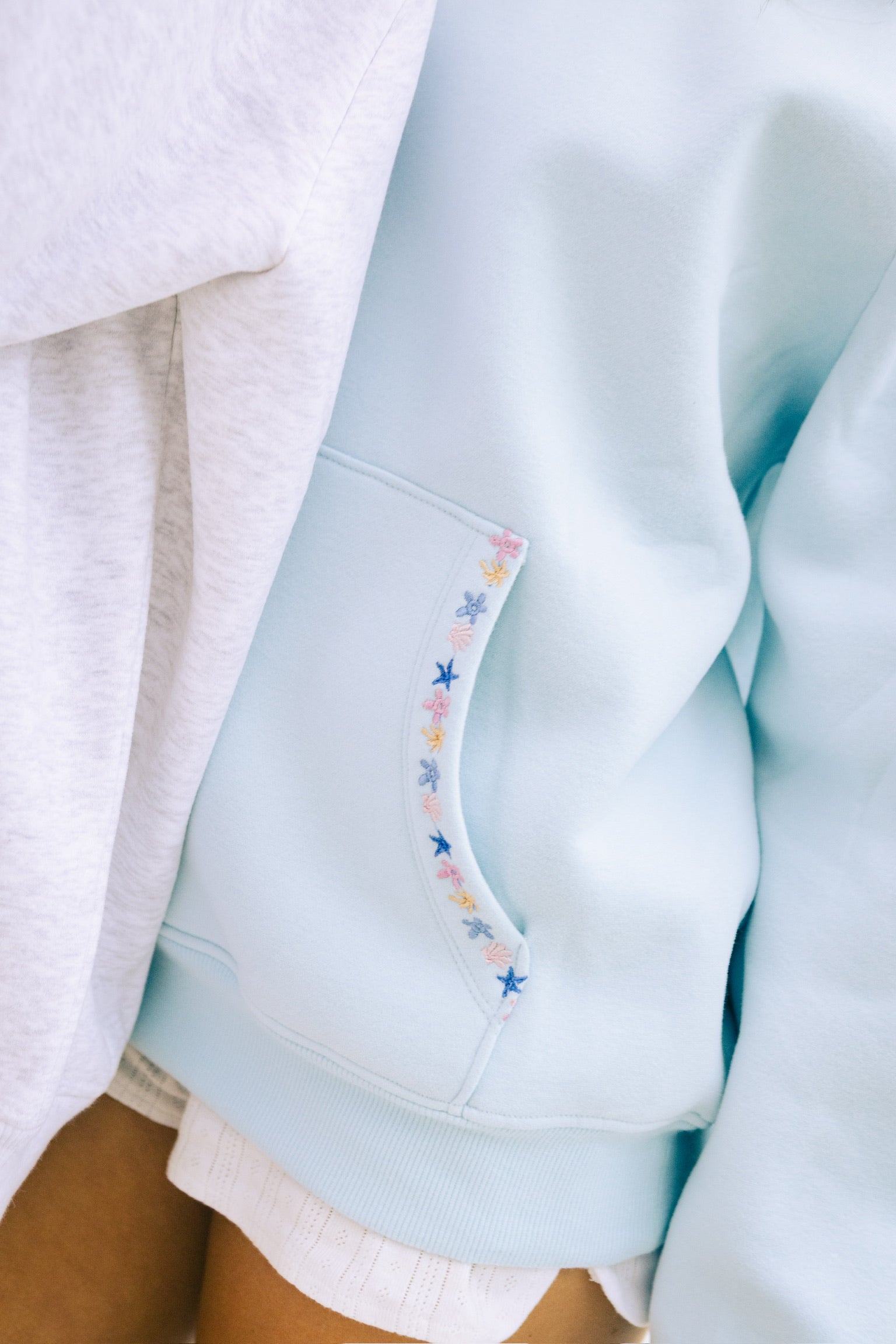 "Chase the Sun" Relaxed Hoodie, relaxed fit with an adjustable drawstring hood and pocket, in Sky Blue - coastal preppy aesthetic beach style by Pink Palm Puff