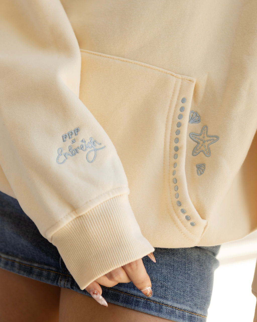 "Live in the Moment" Hoodie, adjustable drawstring hood and pocket, in Sand - coastal preppy aesthetic beach style by Pink Palm Puff