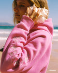 "Under the Sea" Relaxed Hoodie, relaxed fit with an adjustable drawstring hood and pocket, in Seashell Pink - coastal preppy aesthetic beach style by Pink Palm Puff